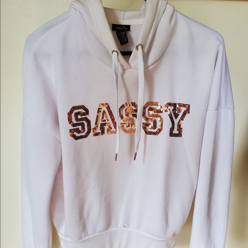 I’m selling a “sassy” white hoodie with sequins!